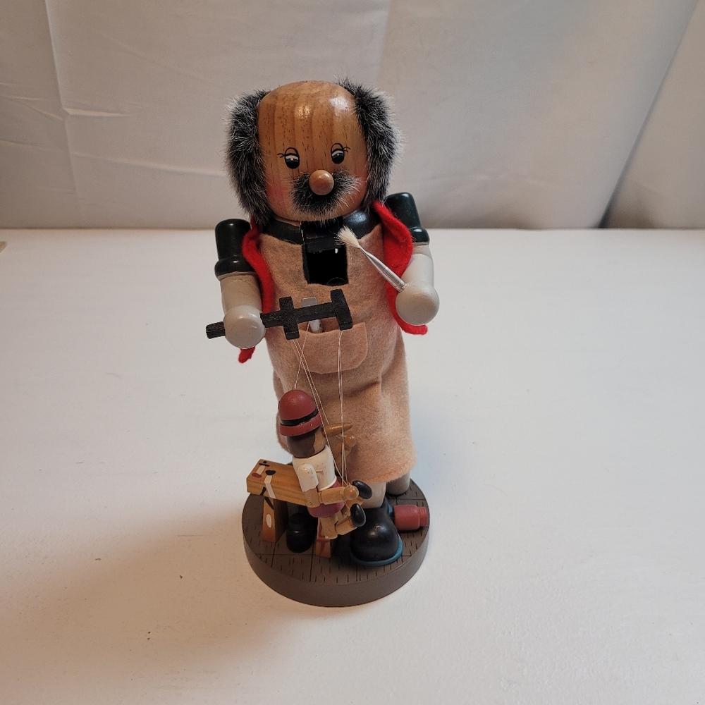 Wooden nutcracker figurine depicting Geppetto, the toymaker from Pinocchio